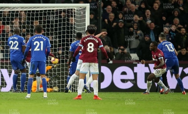 041218 - West Ham United v Cardiff City - Premier League - Michail Antonio of West Ham scores their third goal