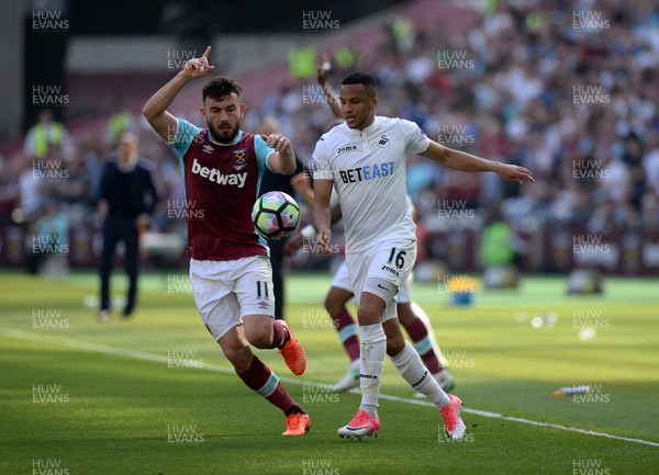 080417 - West Ham United v Swansea City - Premier League  -   Robert Snodgrass of West Ham is challenged by Martin Olsson of Swansea  