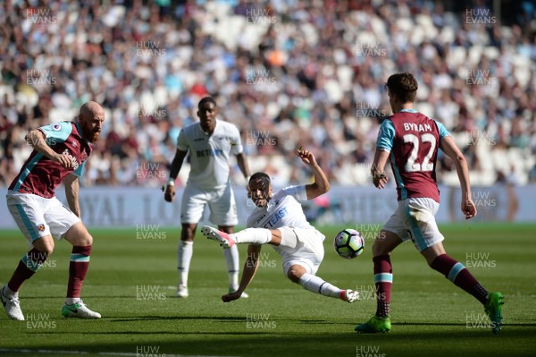 080417 - West Ham United v Swansea City - Premier League  -   Swansea's Martin Olsson goes for a dramatic finish  