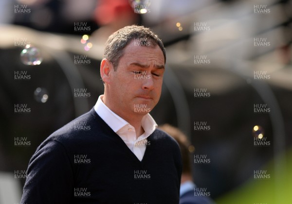 080417 - West Ham United v Swansea City - Premier League  -   Dejected Swansea manager Paul Clement  