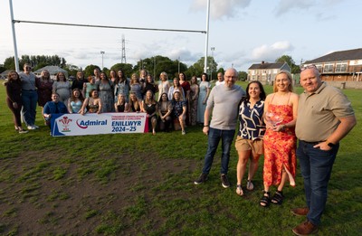 070625 - West Swansea Hawks - Sue Jones captain of West Swansea Hawks with the League Trophy, along with coaches Keith Pritchard, Rhiannon Sheen de Jesus and Andrew Steele as the team celebrate winning the Admiral Women’s West League Title