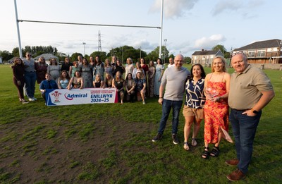 070625 - West Swansea Hawks - Sue Jones captain of West Swansea Hawks with the League Trophy, along with coaches Keith Pritchard, Rhiannon Sheen de Jesus and Andrew Steele as the team celebrate winning the Admiral Women’s West League Title