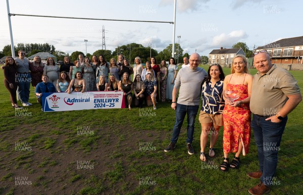 070625 - West Swansea Hawks - Sue Jones captain of West Swansea Hawks with the League Trophy, along with coaches Keith Pritchard, Rhiannon Sheen de Jesus and Andrew Steele as the team celebrate winning the Admiral Women’s West League Title