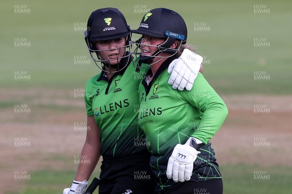 250821 - Western Storm v The Thunder - Charlotte Edwards Cup - Georgia Hennessy and Katie George celebrate after winning the game