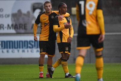 150725 - Weston-Super-Mare v Newport County - Preseason Friendly - Moses-Alexander Walker of Newport County scores the first goal of the game and celebrates with Corey Evans