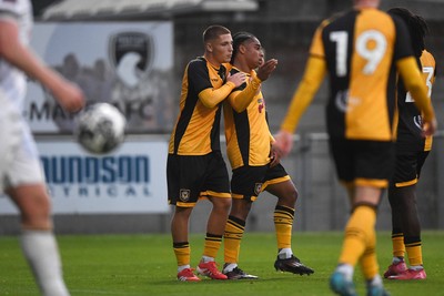 150725 - Weston-Super-Mare v Newport County - Preseason Friendly - Moses-Alexander Walker of Newport County scores the first goal of the game and celebrates with Corey Evans