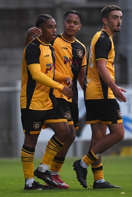 150725 - Weston-Super-Mare v Newport County - Preseason Friendly - Moses-Alexander Walker of Newport County scores the first goal of the game and celebrates with Armani Babah