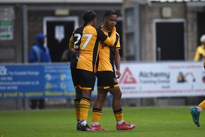 150725 - Weston-Super-Mare v Newport County - Preseason Friendly - Moses-Alexander Walker of Newport County scores the first goal of the game and celebrates with Armani Babah