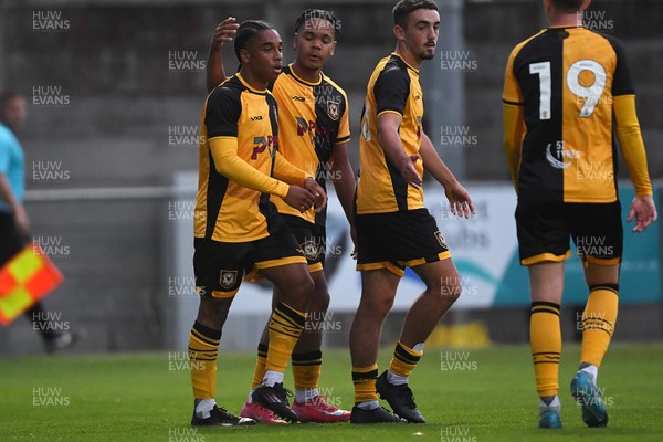 150725 - Weston-Super-Mare v Newport County - Preseason Friendly - Moses-Alexander Walker of Newport County scores the first goal of the game and celebrates with Armani Babah