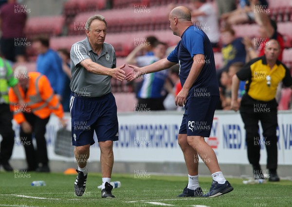 030819 - Wigan Athletic v Cardiff City - Sky Bet Championship - Manager Paul Cook of Wigan Athletic shakes Manager Neil Warnock of Cardiff's hand at end of the match 