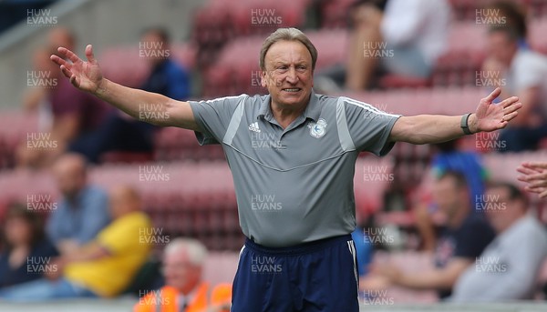 030819 - Wigan Athletic v Cardiff City - Sky Bet Championship -  Manager Neil Warnock of Cardiff can't believe the missed goals Cardiff should have scored