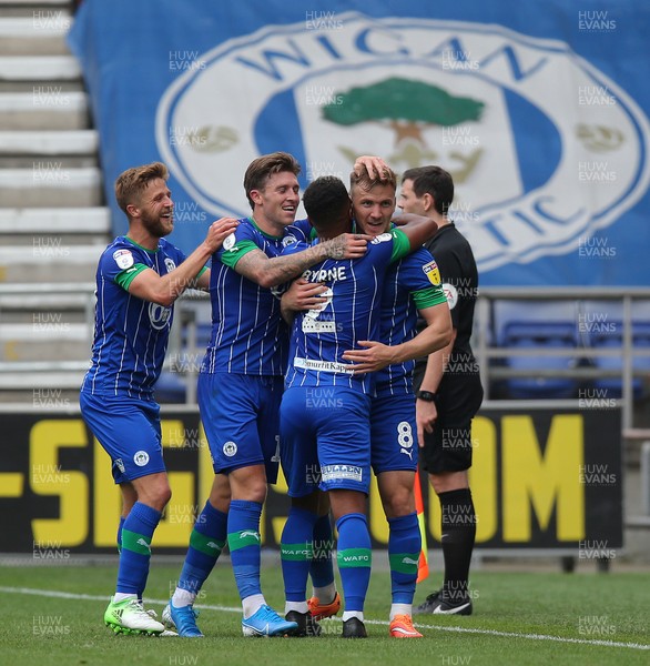030819 - Wigan Athletic v Cardiff City - Sky Bet Championship - Lee Evans of Wigan Athletic [rt] celebrates his goal with team 
