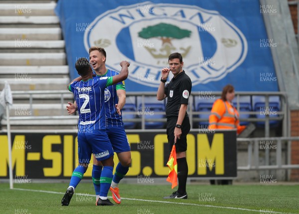 030819 - Wigan Athletic v Cardiff City - Sky Bet Championship - Lee Evans of Wigan Athletic celebrates his goal with Nathan Byrne of Wigan Athletic 