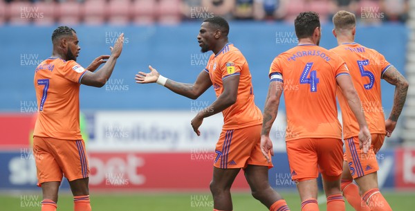 030819 - Wigan Athletic v Cardiff City - Sky Bet Championship - Omar Bogle of Cardiff celebrates his goal in the 2nd half with Leandra Bacuna of Cardiff 