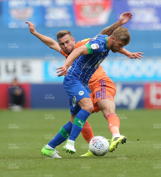 030819 - Wigan Athletic v Cardiff City - Sky Bet Championship - Joe Ralls of Cardiff and Michael Jacobs of Wigan Athletic 