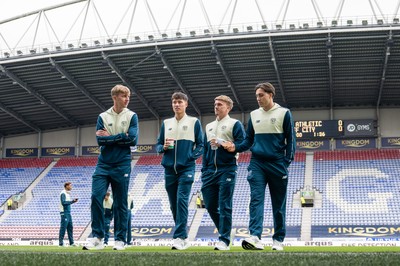 270925 - Wigan Athletic v Cardiff City - Sky Bet League 1 -   Rubin Colwill, Joel Colwill, Isaak Davies and Joel Bagan of Cardiff City arrives arrives ahead of the game
