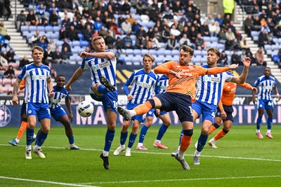 270925 - Wigan Athletic v Cardiff City - Sky Bet League 1 -  Calum Chambers of Cardiff City and Paul Mullin of Wigan Athletic battle for the ball