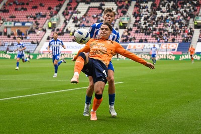 270925 - Wigan Athletic v Cardiff City - Sky Bet League 1 -  Cian Ashford of Cardiff City controls the ball