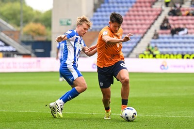 270925 - Wigan Athletic v Cardiff City - Sky Bet League 1 -  Rubin Colwill of Cardiff City makes a break with the ball