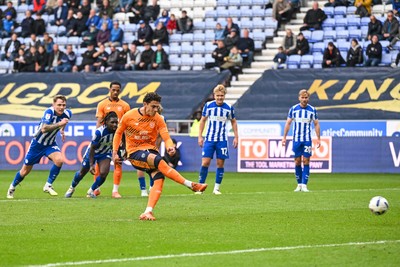 270925 - Wigan Athletic v Cardiff City - Sky Bet League 1 -  Yousef Salech of Cardiff City scores a penalty