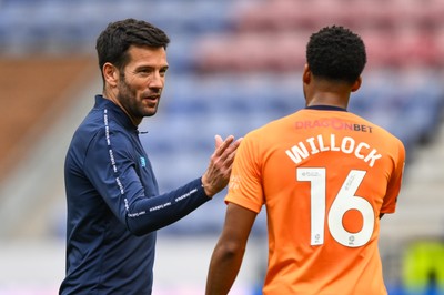 270925 - Wigan Athletic v Cardiff City - Sky Bet League 1 -   Brian Barry-Murphy, Manager of Cardiff City, clebrates with Chris Willock of Cardiff City