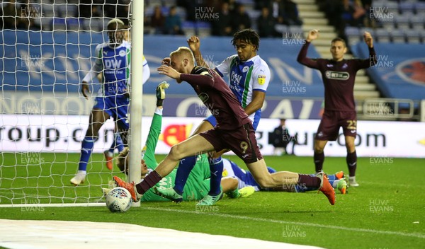 021018 - Wigan Athletic v Swansea City - SkyBet Championship - Oli McBurnie of Swansea City can't get the ball in time