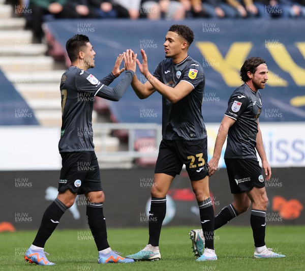 100423 - Wigan Athletic v Swansea City - Sky Bet Championship - Joel Piroe of Swansea celebrates scoring the 2nd goal with Nathan Wood