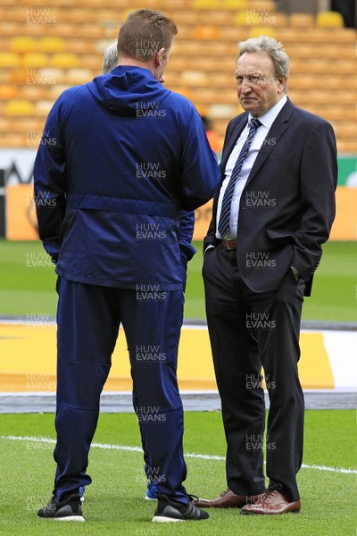 020319 - Wolverhampton Wanderers v Cardiff City, Premier League - Cardiff City Manager Neil Warnock on the Molineux Stadium pitch before the match