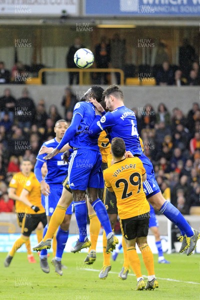 020319 - Wolverhampton Wanderers v Cardiff City, Premier League - Bruno Ecuele Manga (left) and Sean Morrison of Cardiff City attempt to head a cross