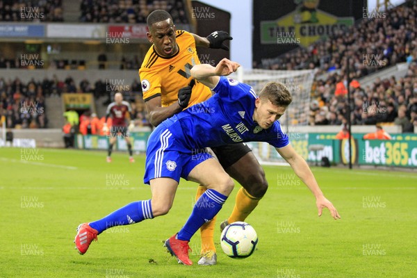 020319 - Wolverhampton Wanderers v Cardiff City, Premier League - Rhys Healey of Cardiff City (right) in action with Willy Boly of Wolverhampton Wanderers