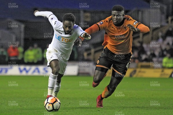 060118 - Wolverhampton Wanderers v Swansea City, FA Cup Third Round - Nathan Dyer of Swansea City (left) in action with  Alfred N'Diaye of Wolverhampton Wanderers