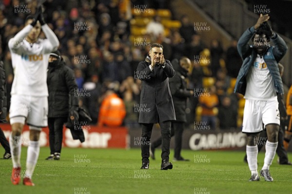 060118 - Wolverhampton Wanderers v Swansea City, FA Cup Third Round - Swansea City Manager Carlos Carvalhal (centre) applauds the Swansea City fans at the end of the match