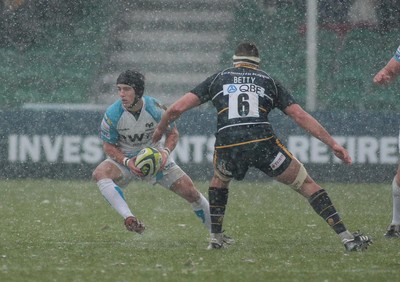 04.02.12 Worcester v Ospreys - LV=Cup -.Ospreys' Matthew Morgan looks to escape from Worcester's Sam Betty .