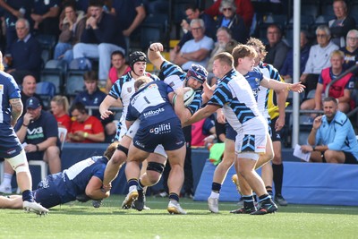 050926 - Worcester Warriors v Cardiff Rugby - Preseason Friendly - Tom Manz of Cardiff is tackled by Cam Miell(1)  of Worcester Warriors