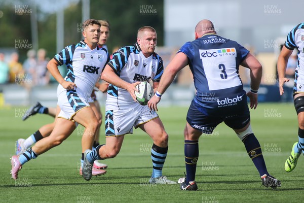 050926 - Worcester Warriors v Cardiff Rugby - Preseason Friendly - Dan Thomas of Cardiff takes on Fraser Balmain of Worcester Warriors