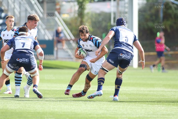 050926 - Worcester Warriors v Cardiff Rugby - Preseason Friendly - Luca de la Rua of Cardiff takes on John Hawkins of Worcester Warriors