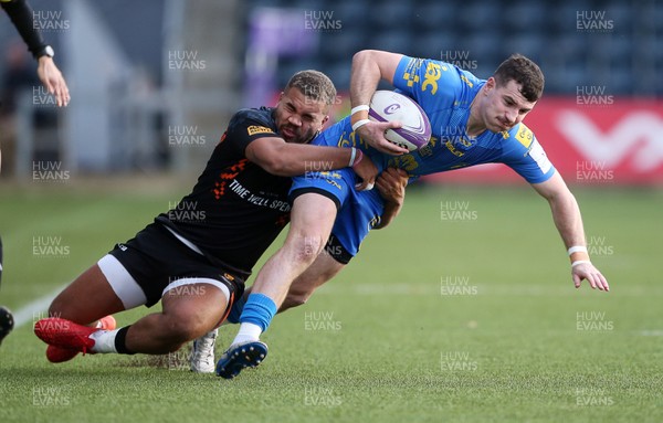 071219 - Worcester Warriors v Dragons - European Rugby Challenge Cup - Owen Jenkins of Dragons is tackled by Ollie Lawrence of Worcester