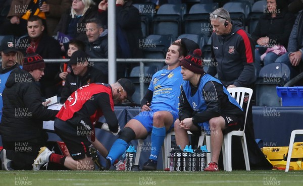 071219 - Worcester Warriors v Dragons - European Rugby Challenge Cup - Tom Griffiths of Dragons has he knee strapped as he goes off injured