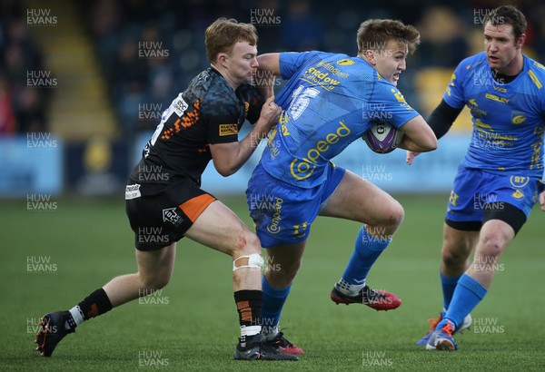 071219 - Worcester Warriors v Dragons - European Rugby Challenge Cup - Will Talbot-Davies of Dragons is tackled by Gareth Simpson of Worcester