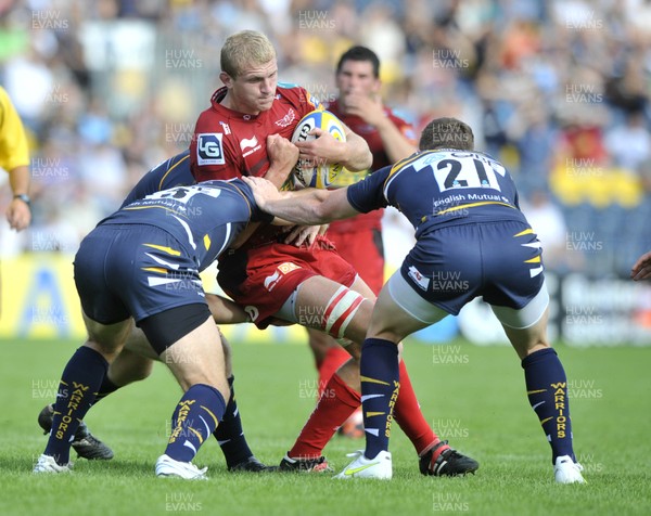 180812 - Worcester v Scarlets - Pre Season Friendly -  Scarlets' Craig Price is surrounded   