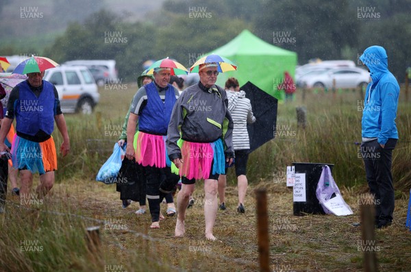 260818 - Picture shows people arriving to take part in the annual World Bog Snorkelling Championships in Llanwrtyd Wells, Powys, Wales