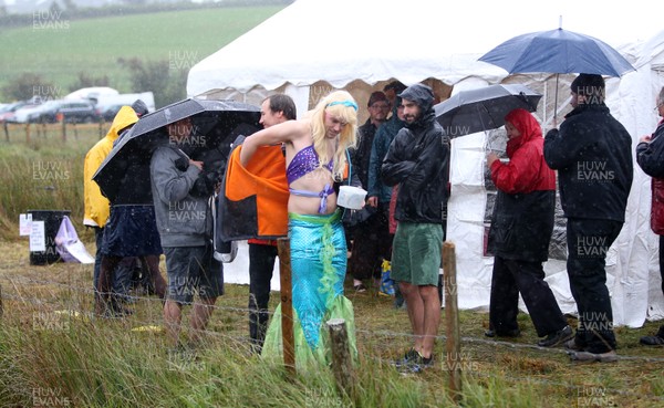 260818 - Picture shows people arriving to take part in the annual World Bog Snorkelling Championships in Llanwrtyd Wells, Powys, Wales