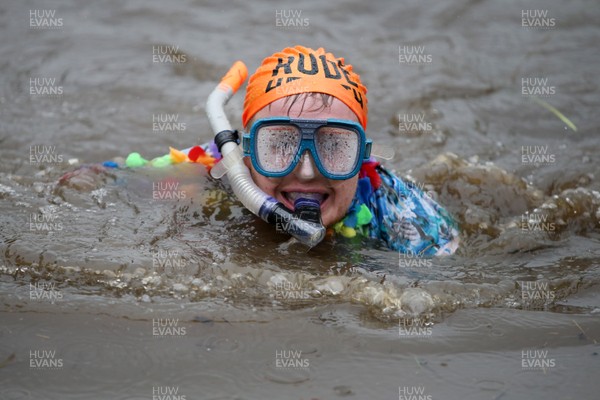 260818 - Picture shows people taking part in the annual World Bog Snorkelling Championships in Llanwrtyd Wells, Powys, Wales