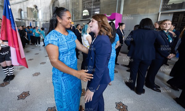 170825 - Women’s Rugby World Cup Welcome Ceremony - Wales’ Kate Williams embraces friends at the Women’s Rugby World Cup welcome ceremony at Manchester Town Hall 