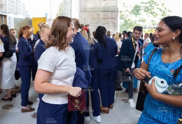 170825 - Women’s Rugby World Cup Welcome Ceremony - Wales’ players exchange gifts with the other teams at the Women’s Rugby World Cup welcome ceremony at Manchester Town Hall 