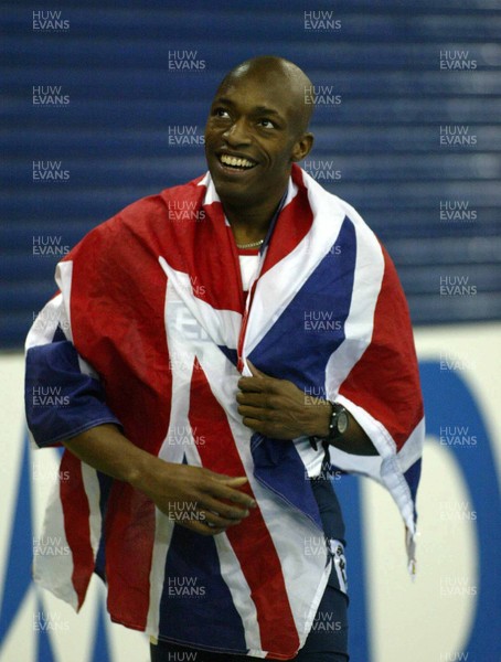 150303 - IAAF World Indoor Championships - Marlon Devonish looks happy after winning the 200m final