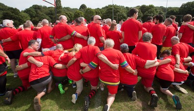 240816 - World Record attempt for the Largest Rugby Scrum - Participants set a new World Record of 1297 in the Worlds Largest Rugby Scrum at the Golden Oldies World Rugby Festival in Cardiff