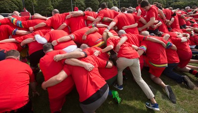 240816 - World Record attempt for the Largest Rugby Scrum - Participants set a new World Record of 1297 in the Worlds Largest Rugby Scrum at the Golden Oldies World Rugby Festival in Cardiff