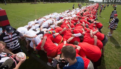 240816 - World Record attempt for the Largest Rugby Scrum - Participants set a new World Record of 1297 in the Worlds Largest Rugby Scrum at the Golden Oldies World Rugby Festival in Cardiff