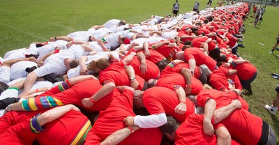 240816 - World Record attempt for the Largest Rugby Scrum - Participants set a new World Record of 1297 in the Worlds Largest Rugby Scrum at the Golden Oldies World Rugby Festival in Cardiff